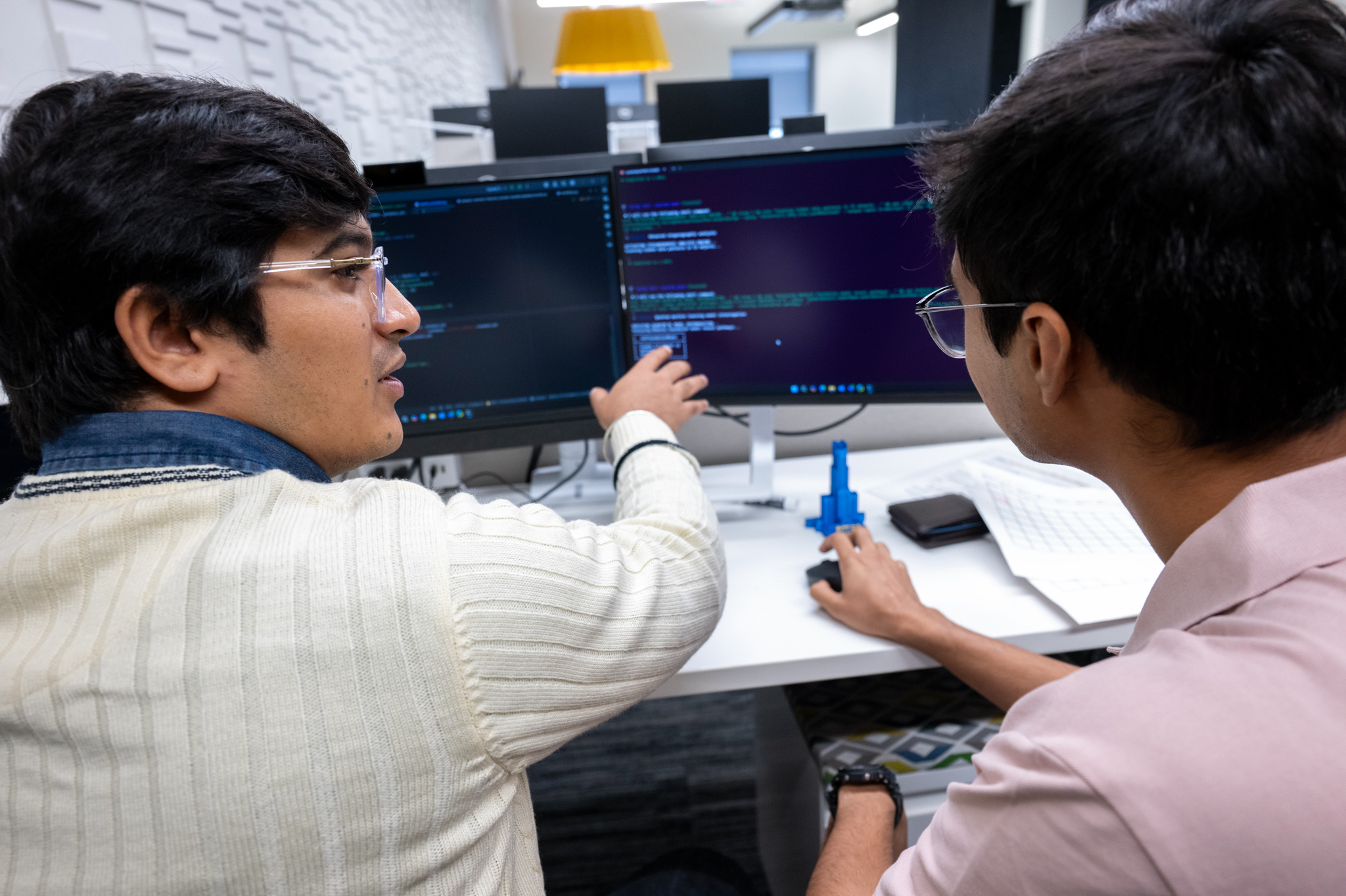 varun and misran working on project